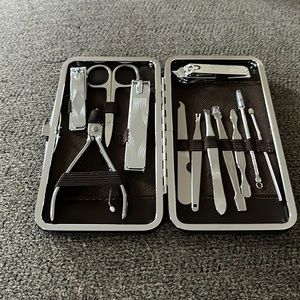 Manicure set in brown faux leather case